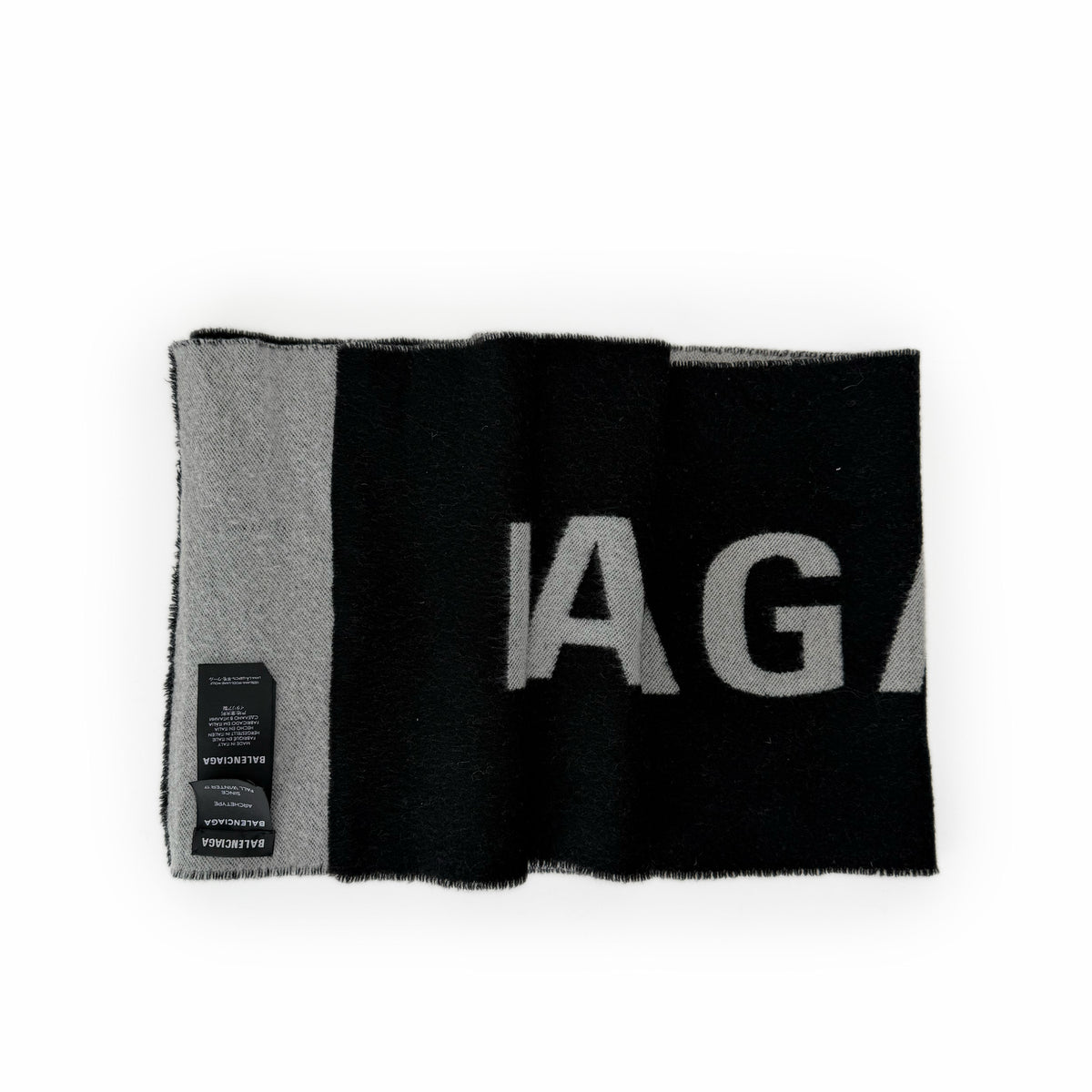 Two-tone grey and black Balenciaga wool scarf with logo, curated Pre-loved Luxury by Myluxe in Helsinki.