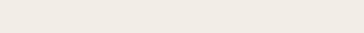 A plain, solid light beige background.