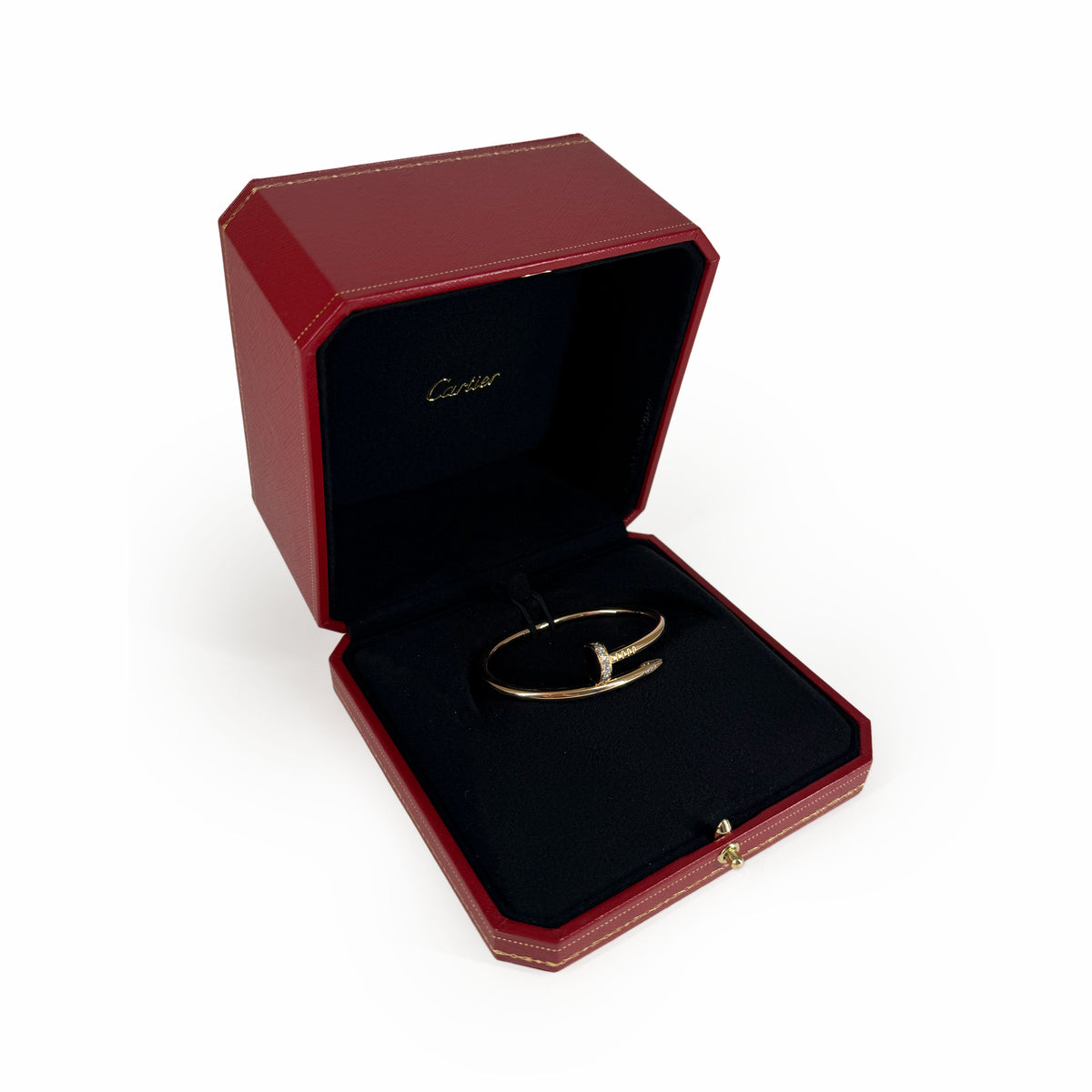 Cartier gold bangle bracelet in a red luxury gift box, curated Pre-loved Luxury by Myluxe in Helsinki.