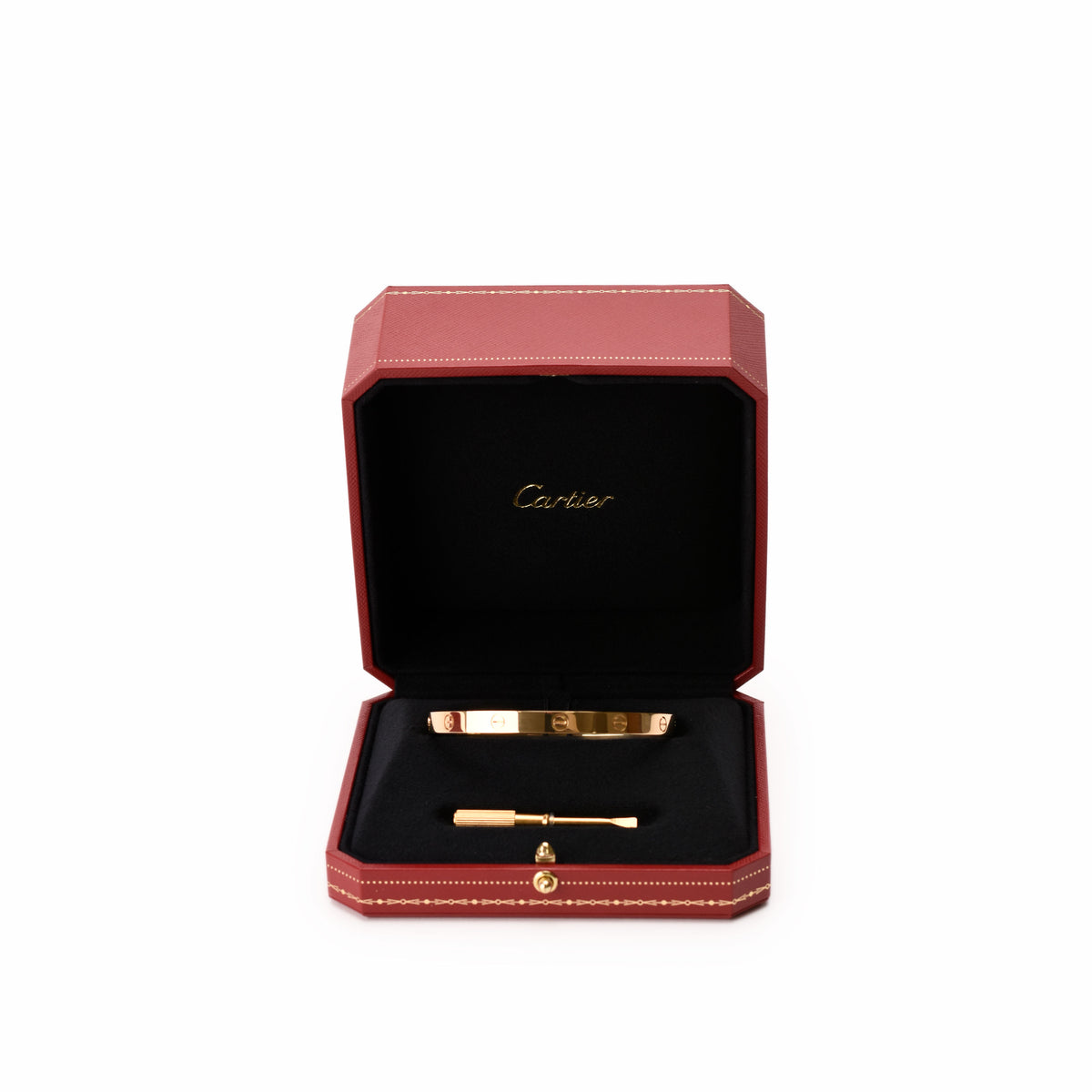 Cartier Love bracelet in yellow gold with signature screw motifs, showcasing elegant jewelry design and craftsmanship.