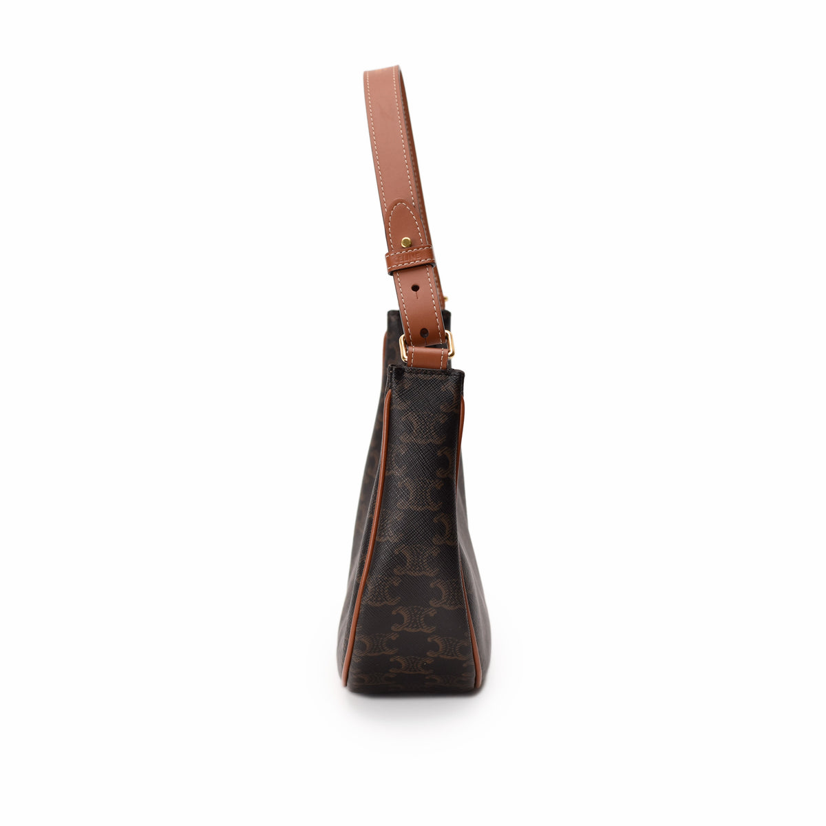 Side view of a brown monogram Celine handbag with tan leather strap. curated Pre-loved Luxury by Myluxe in Helsinki.