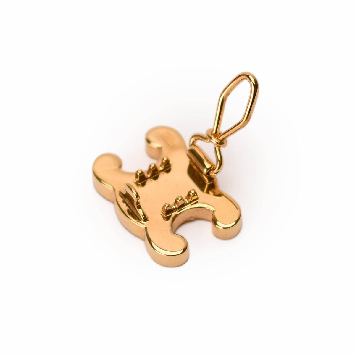 Gold-tone designer charm in a unique sculptural shape, curated Pre-loved Luxury by Myluxe in Helsinki.