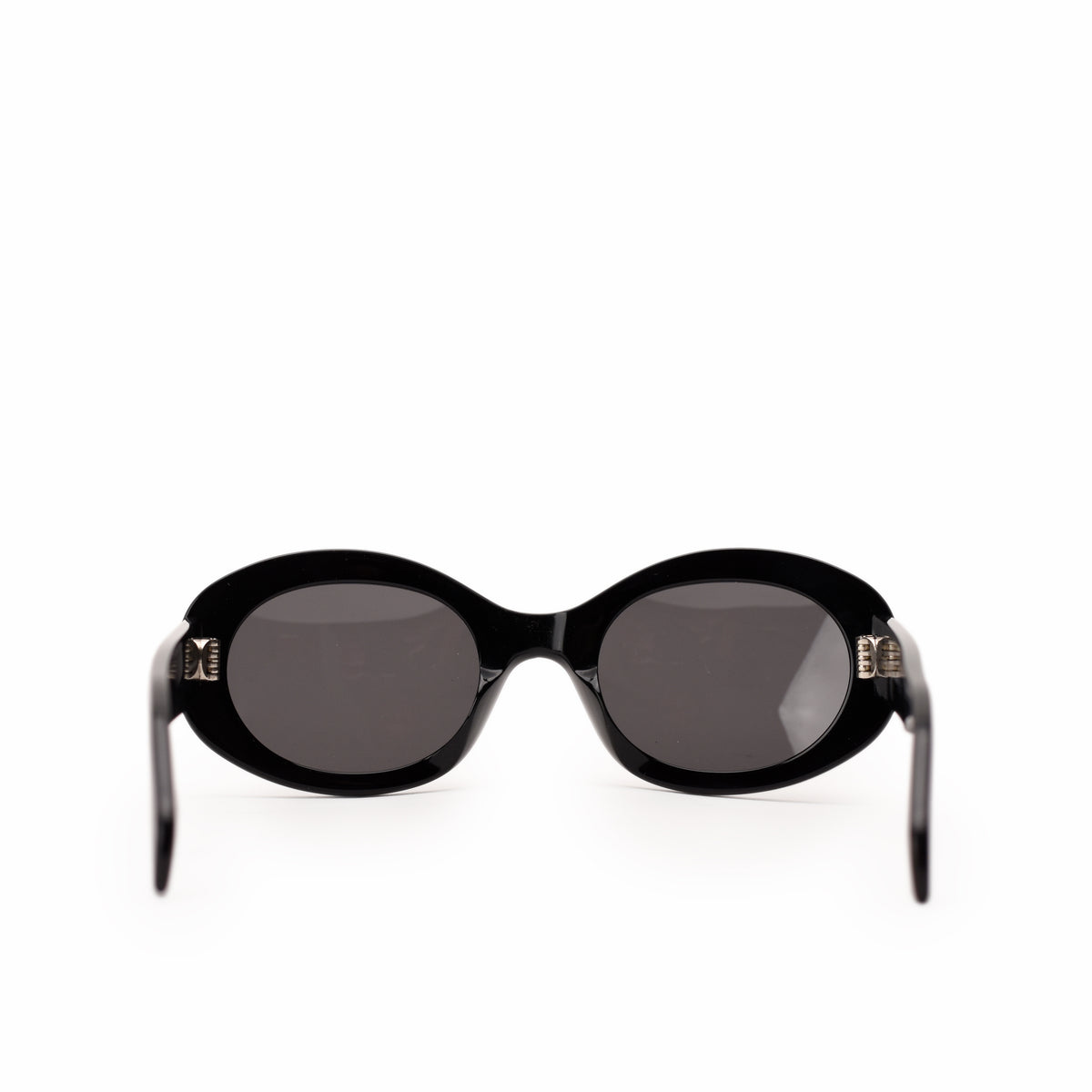 Black oval-shaped luxury sunglasses with dark tinted lenses, curated Pre-loved Luxury by Myluxe in Helsinki.