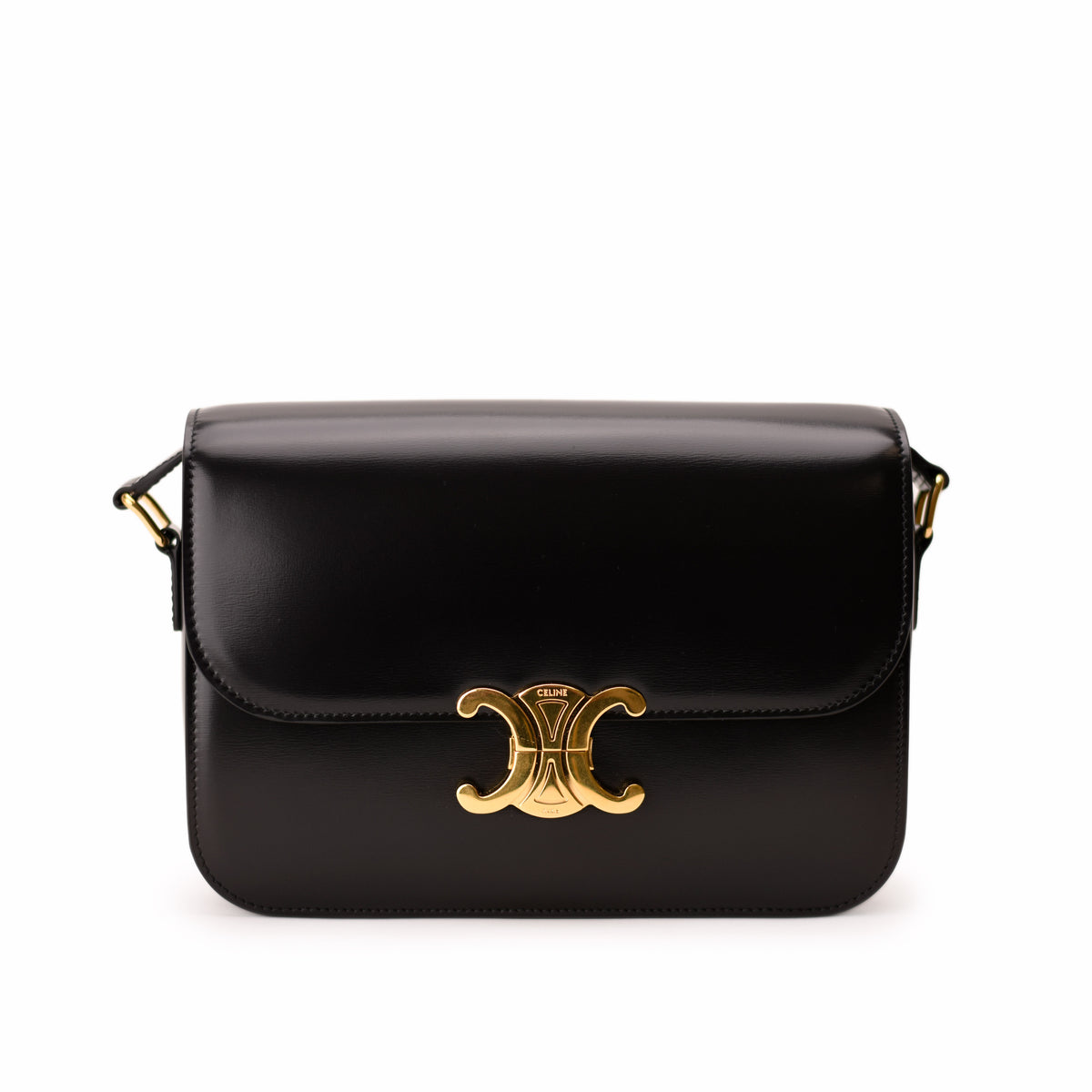 Black leather Celine Triomphe shoulder bag with gold-tone hardware. curated Pre-loved Luxury by Myluxe in Helsinki.