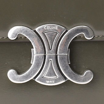 Silver Celine Triomphe clasp on a dark army shiny calfskin bag. curated Pre-loved Luxury by Myluxe in Helsinki.