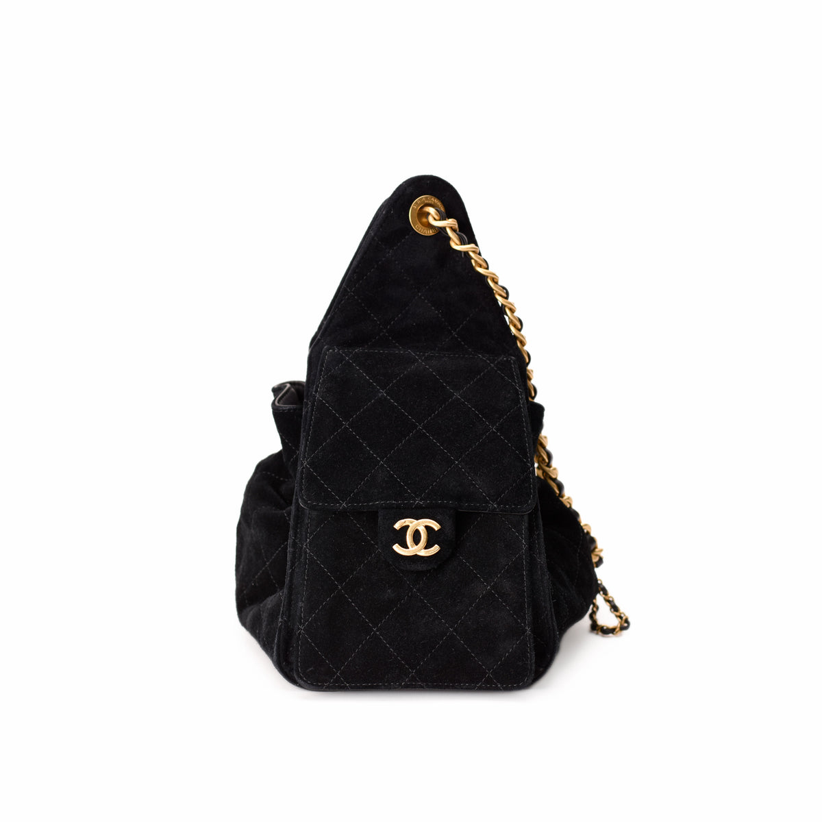 Black quilted suede Chanel handbag with gold chain strap, curated Pre-loved Luxury by Myluxe in Helsinki.