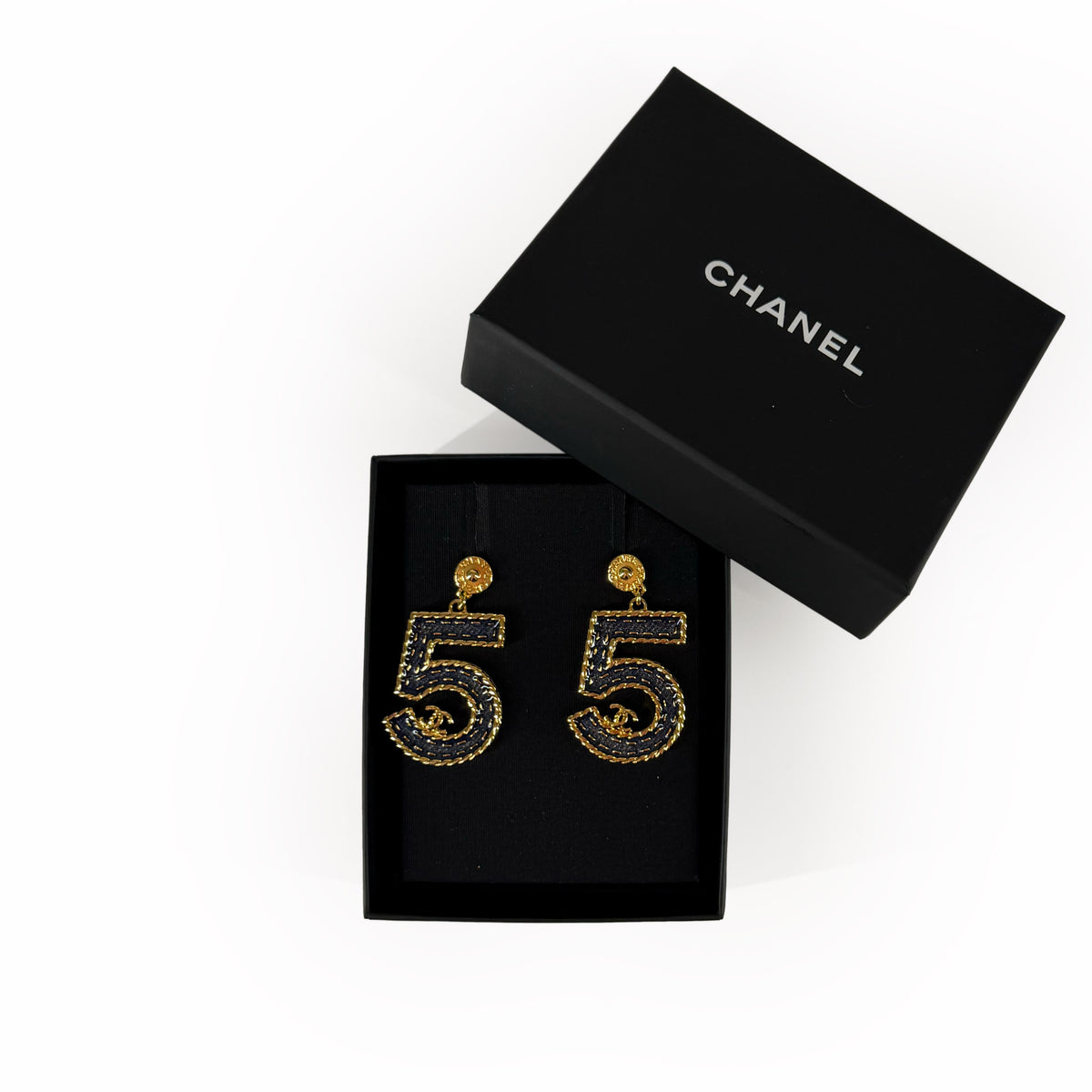 Gold-tone Chanel number 5 earrings with black pavé crystals, curated Pre-loved Luxury by Myluxe in Helsinki.