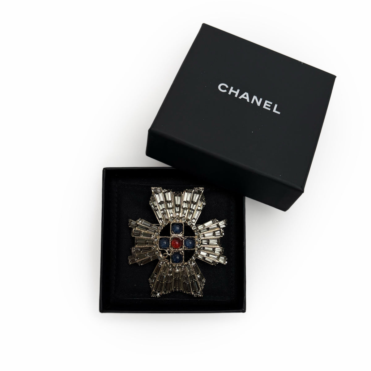 Chanel vintage crystal and multicolored gemstone cross brooch, curated Pre-loved Luxury by Myluxe in Helsinki.
