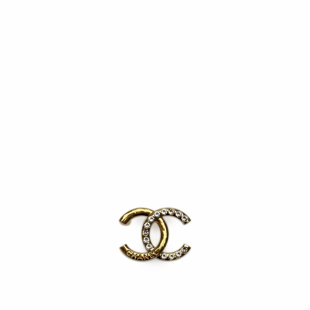 Gold-tone Chanel interlocking CC brooch encrusted with clear crystals, curated Pre-loved Luxury by Myluxe in Helsinki.