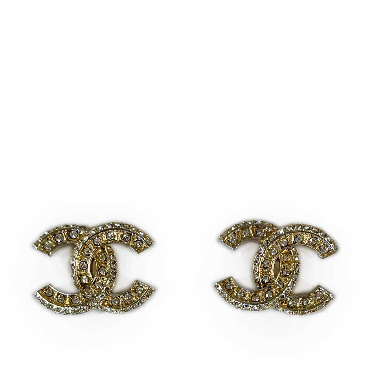 Gold-tone Chanel interlocking CC earrings encrusted with crystals, curated Pre-loved Luxury by Myluxe in Helsinki.