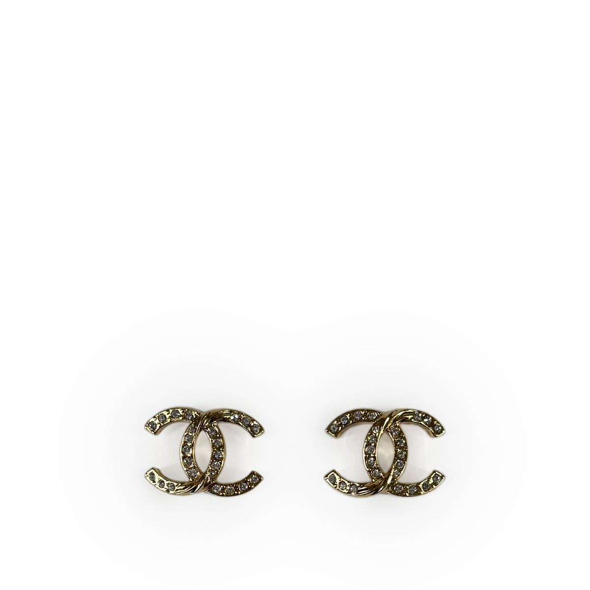 Gold-tone Chanel interlocking C earrings with pavé crystals, curated Pre-loved Luxury by Myluxe in Helsinki.