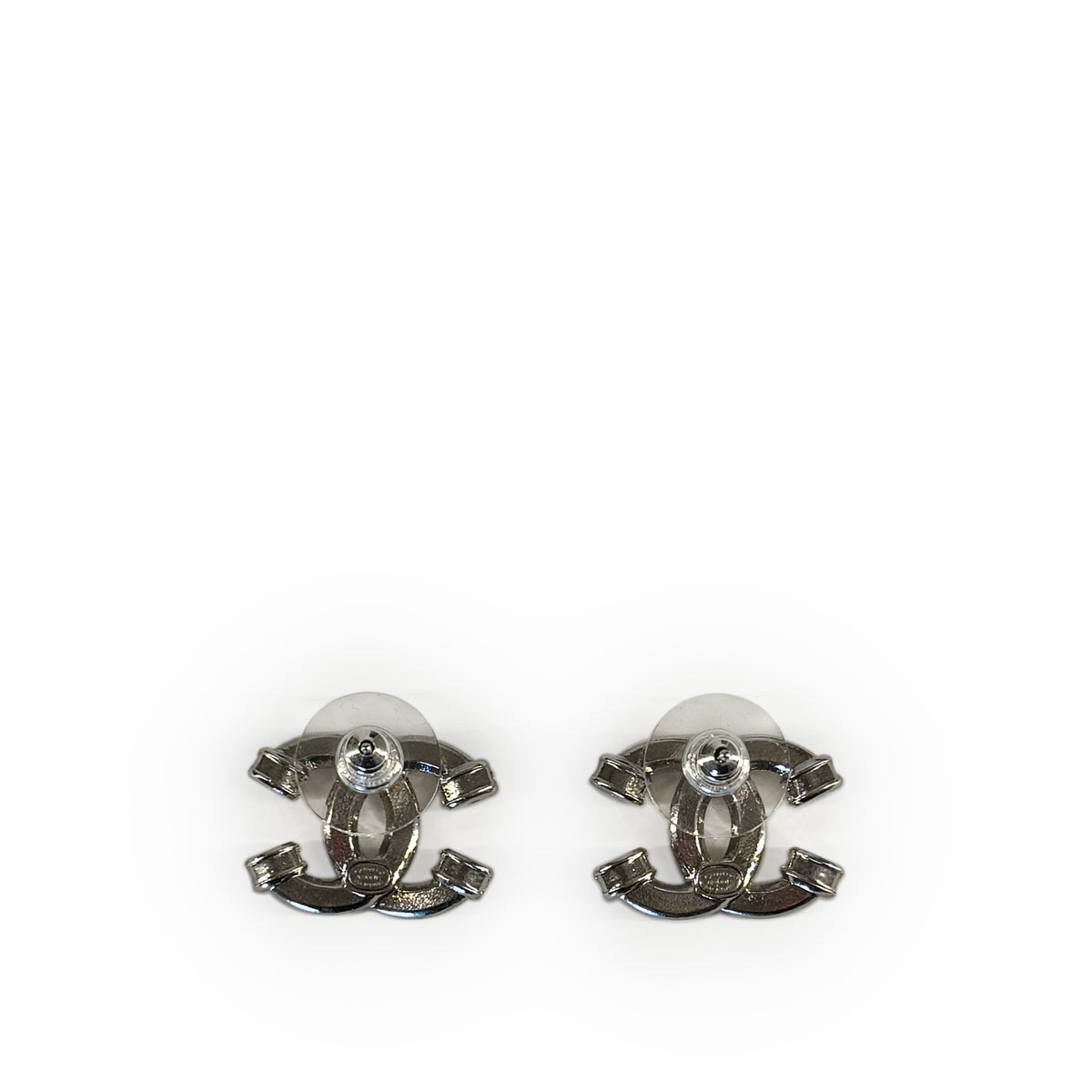 Silver-tone metal interlocking CC logo stud earrings, curated Pre-loved Luxury by Myluxe in Helsinki.