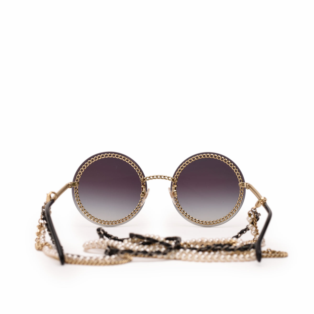 Round dark gradient sunglasses with gold chain detail, curated Pre-loved Luxury by Myluxe in Helsinki.