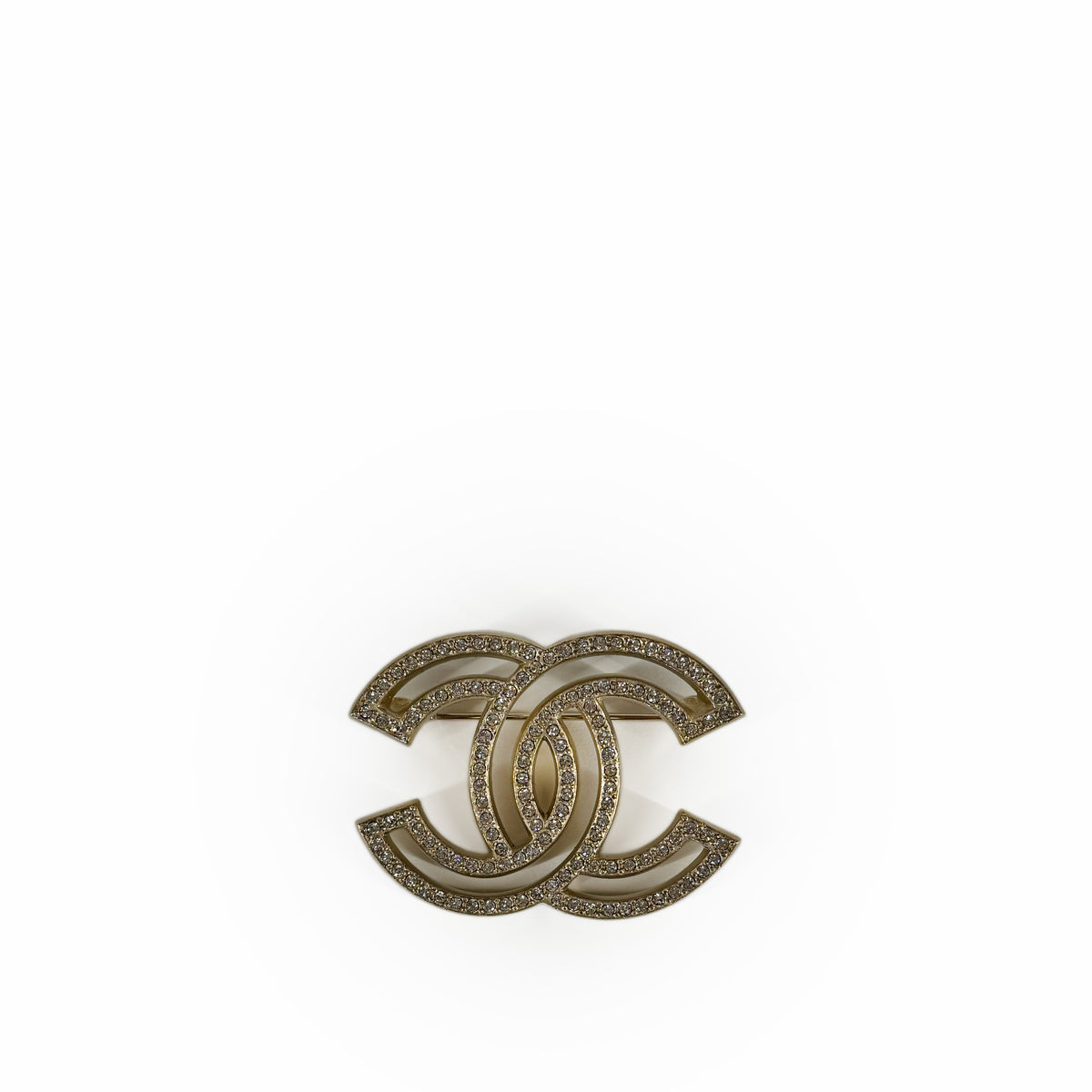 Gold-tone interlocking CC logo jewelry with sparkling crystal embellishments, curated Pre-loved Luxury by Myluxe in Helsinki.