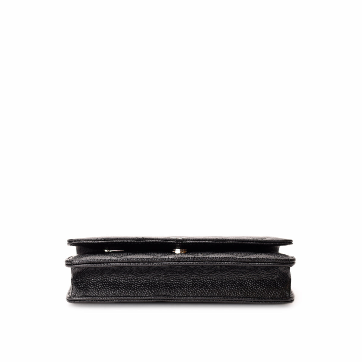 Side view of a black pebbled leather luxury handbag, curated Pre-loved Luxury by Myluxe in Helsinki.