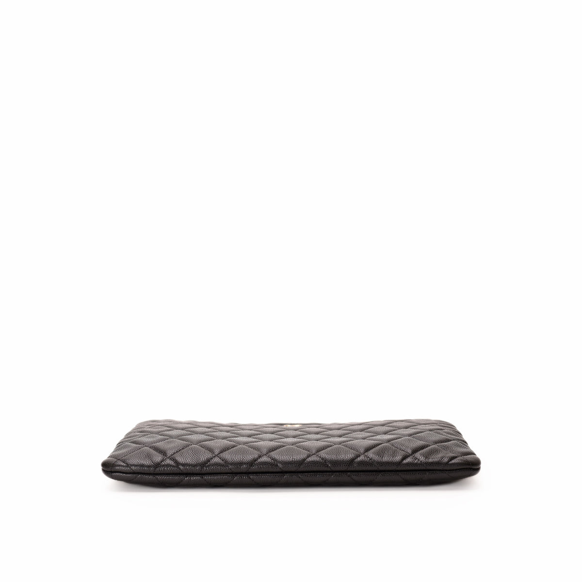 Black quilted leather Chanel clutch bag. curated Pre-loved Luxury by Myluxe in Helsinki.