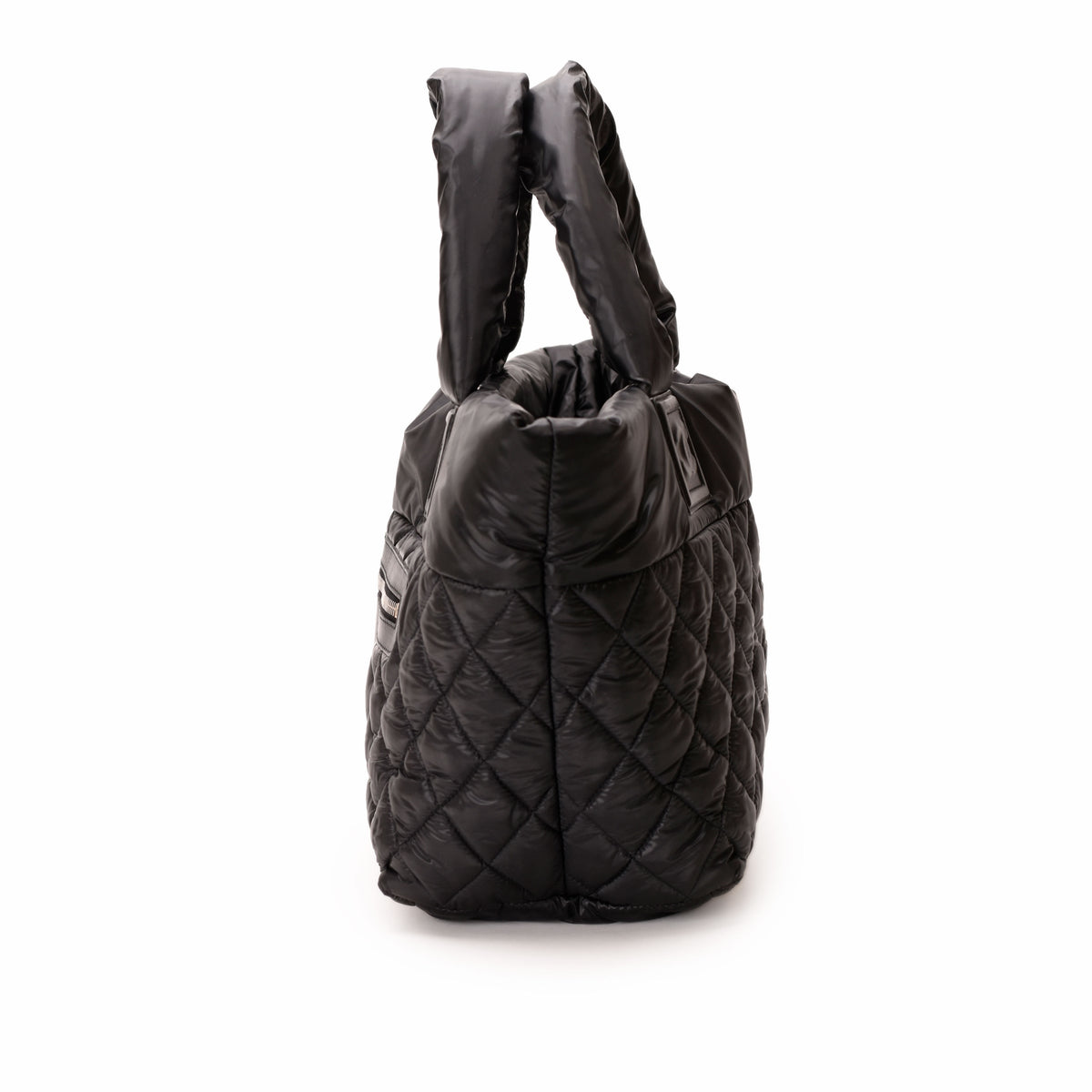 Black quilted nylon puffer handbag with top handles, curated Pre-loved Luxury by Myluxe in Helsinki.
