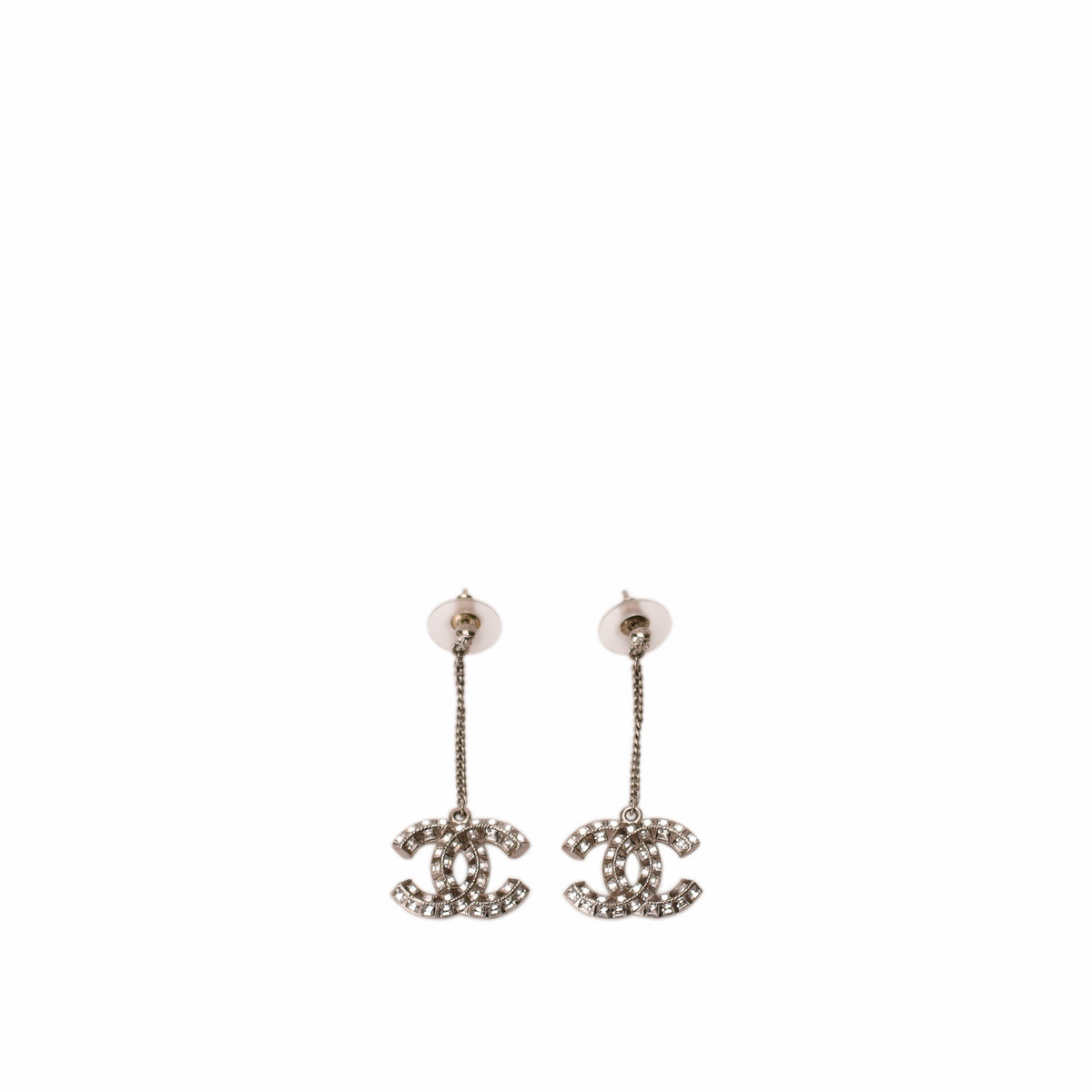 Chanel silver-tone crystal logo drop earrings. curated Pre-loved Luxury by Myluxe in Helsinki.
