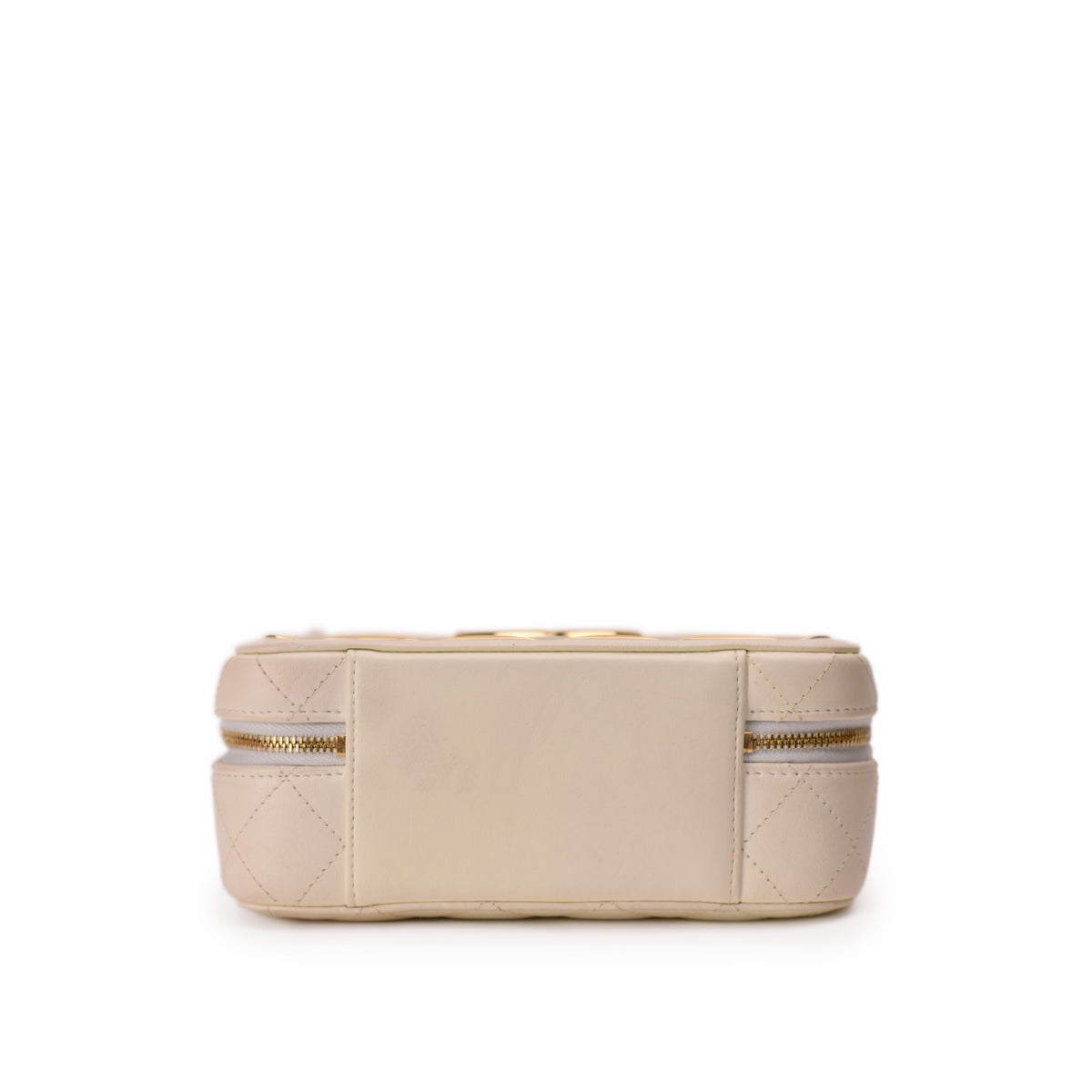 Cream quilted leather cosmetic pouch with gold zipper. curated Pre-loved Luxury by Myluxe in Helsinki.