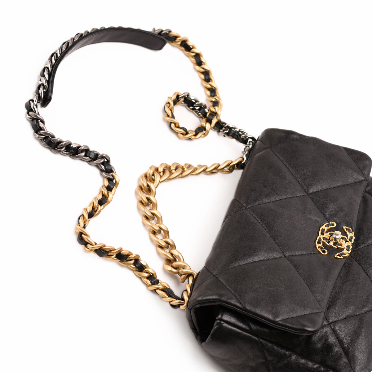 Black quilted lambskin leather handbag with gold-tone chain strap, curated Pre-loved Luxury by Myluxe in Helsinki.