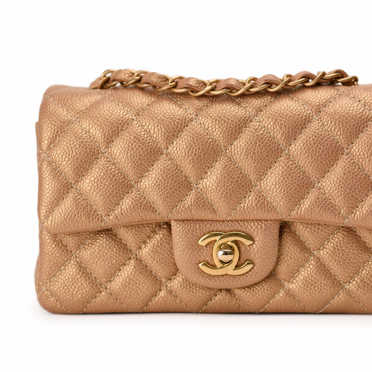 Gold metallic quilted leather Chanel handbag with gold-tone chain and CC logo; curated Pre-loved Luxury by Myluxe in Helsinki.