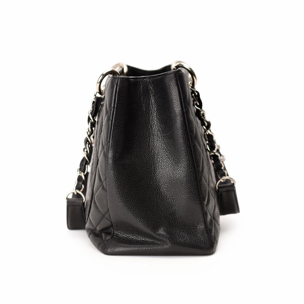 Black quilted caviar leather Chanel handbag with silver chain strap. curated Pre-loved Luxury by Myluxe in Helsinki.