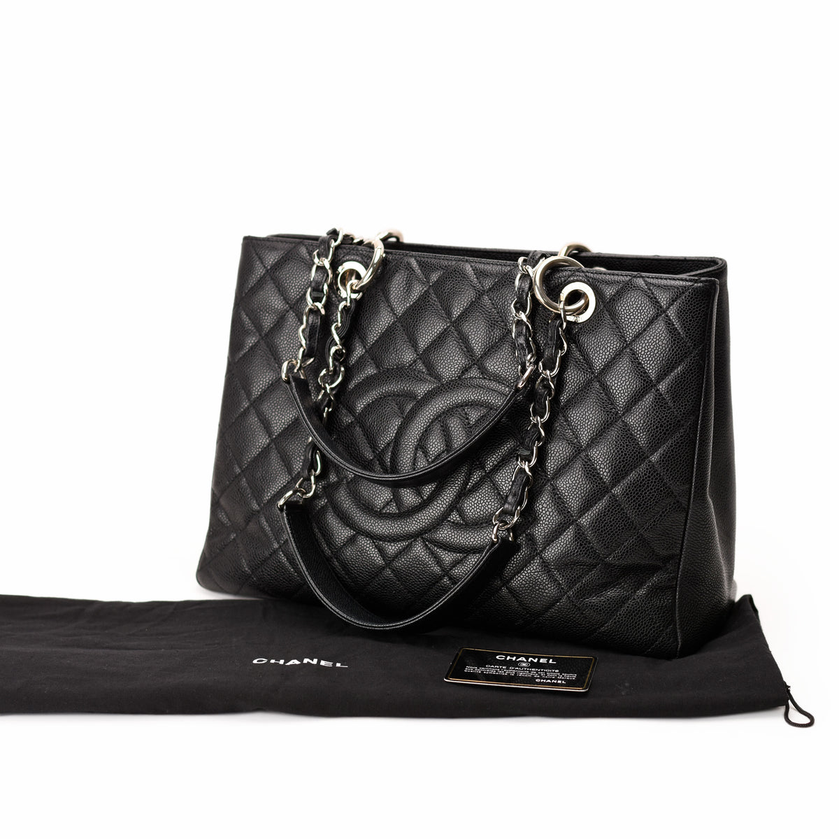 Black quilted caviar leather Chanel tote bag with silver chain straps. curated Pre-loved Luxury by Myluxe in Helsinki.