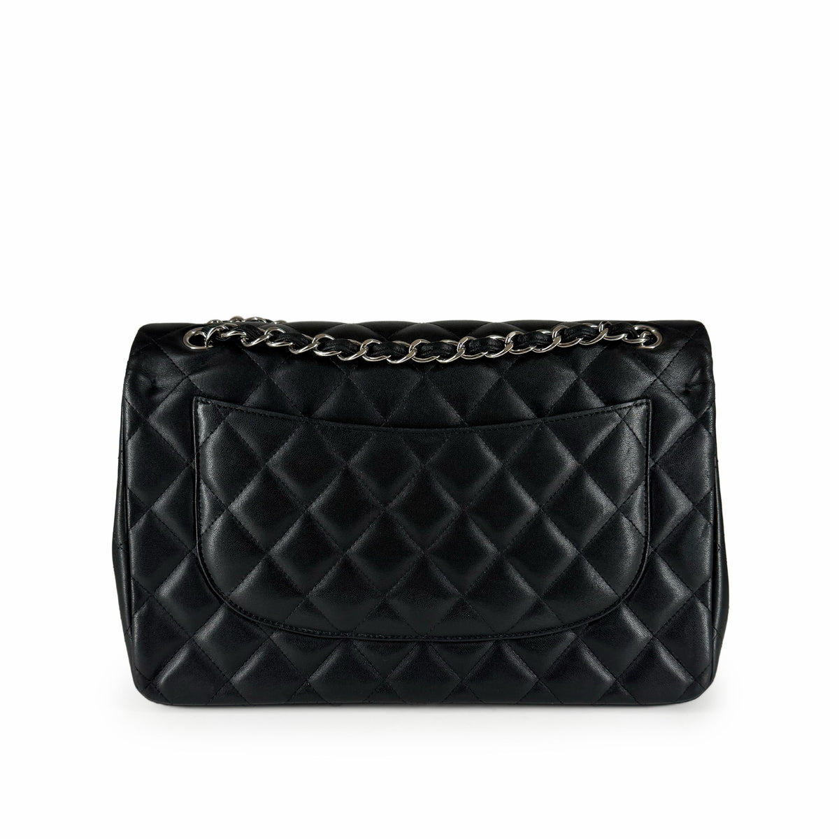 Black quilted leather flap handbag with silver chain strap, curated Pre-loved Luxury by Myluxe in Helsinki.
