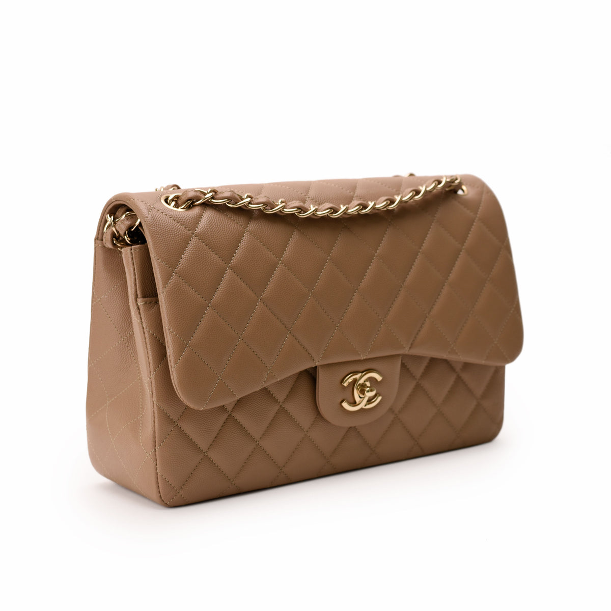 Tan quilted leather Chanel flap bag with gold chain strap, curated Pre-loved Luxury by Myluxe in Helsinki.