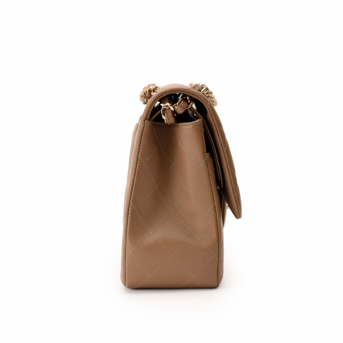 Side view of a tan quilted leather handbag with gold chain strap, curated Pre-loved Luxury by Myluxe in Helsinki.