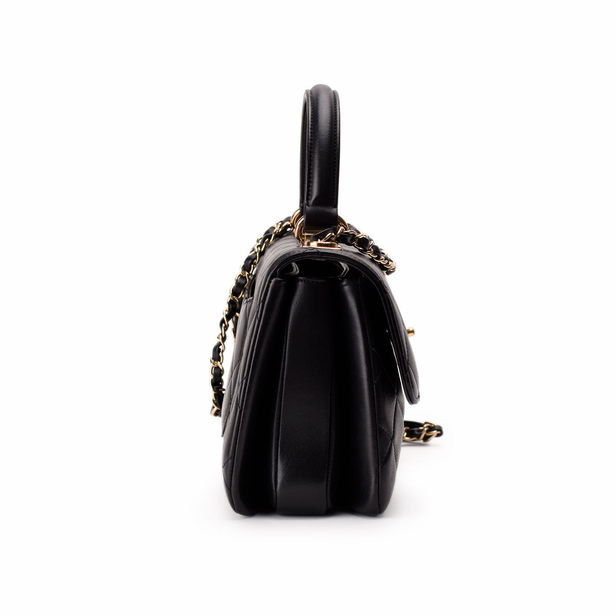 Black quilted leather Chanel handbag with gold chain strap, curated Pre-loved Luxury by Myluxe in Helsinki.