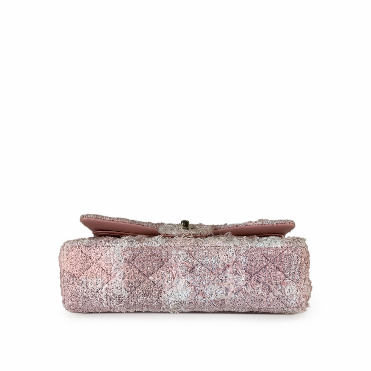 Pink quilted tweed luxury clutch with bow detail, curated Pre-loved Luxury by Myluxe in Helsinki.