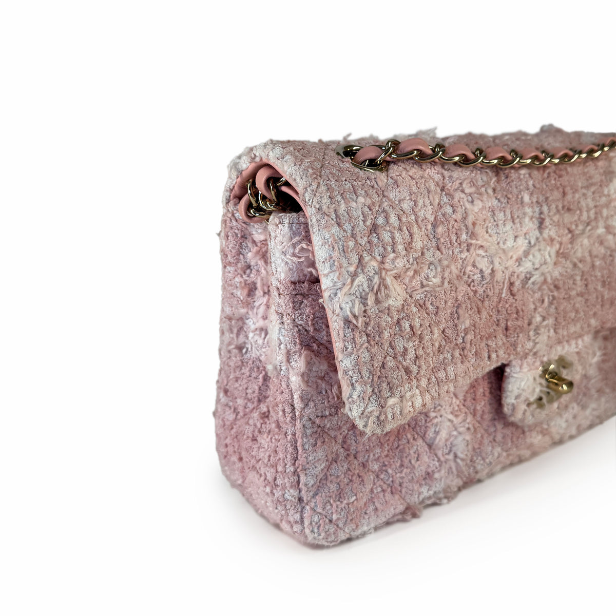 Pink quilted textured leather flap handbag with gold chain strap, curated Pre-loved Luxury by Myluxe in Helsinki.