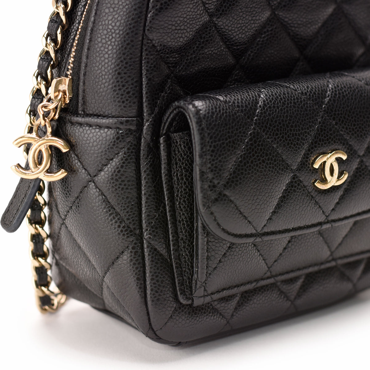 Black quilted caviar leather Chanel handbag with gold hardware, curated Pre-loved Luxury by Myluxe in Helsinki.