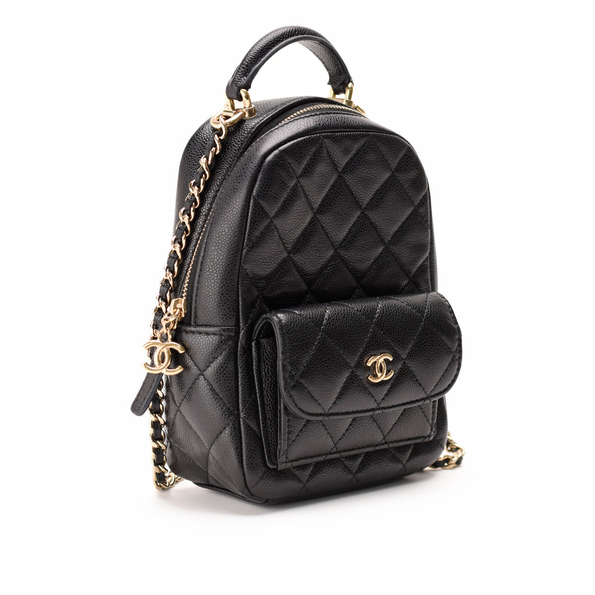 Black quilted leather Chanel backpack with gold-tone chain strap, curated Pre-loved Luxury by Myluxe in Helsinki.