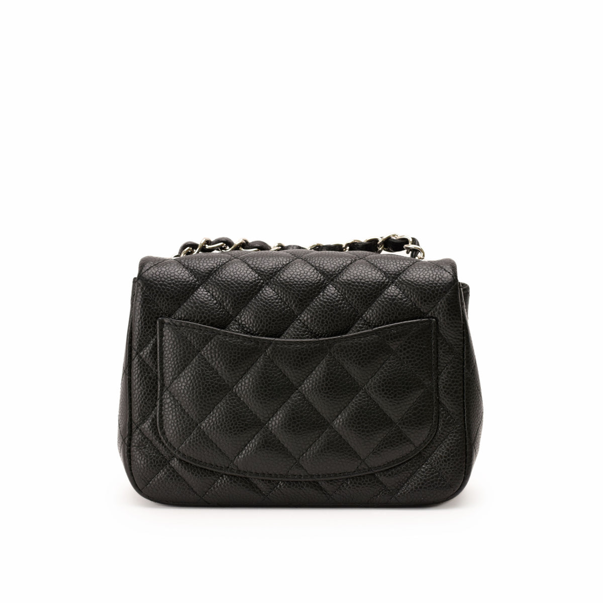 Black quilted caviar leather flap handbag with silver chain strap, curated Pre-loved Luxury by Myluxe in Helsinki.