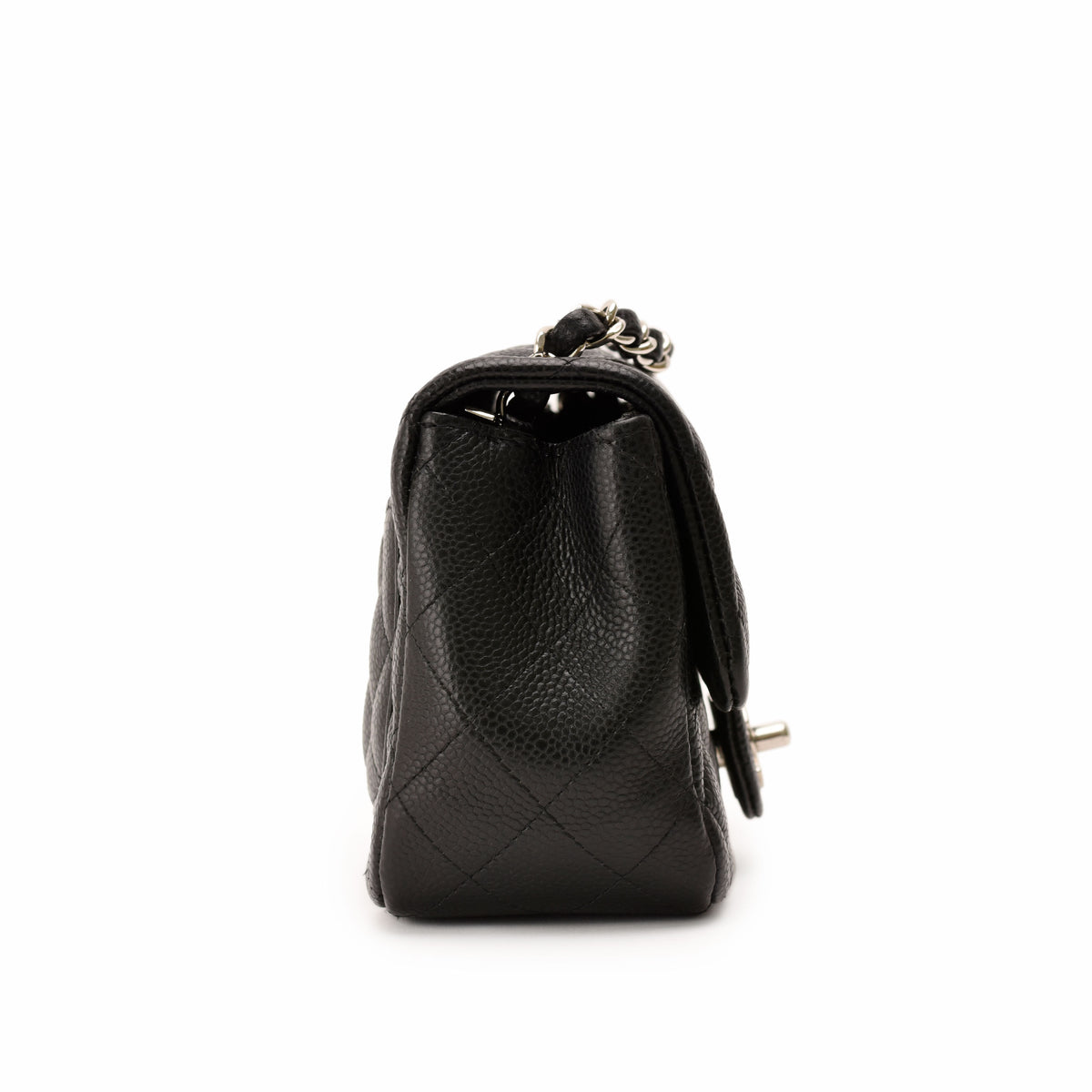 Black quilted caviar leather handbag with silver chain strap, curated Pre-loved Luxury by Myluxe in Helsinki.