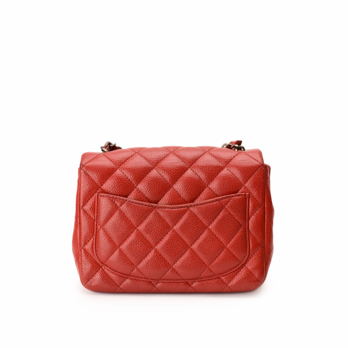 Red quilted lambskin leather Chanel flap bag. curated Pre-loved Luxury by Myluxe in Helsinki.