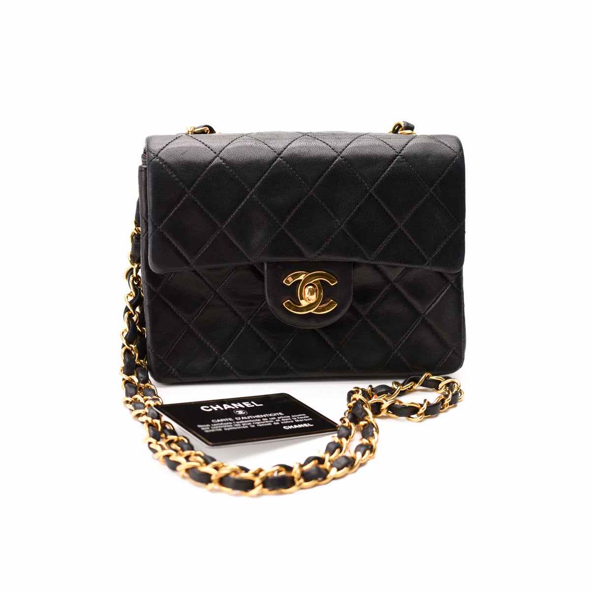 Black quilted lambskin Chanel flap bag with gold-tone hardware, curated Pre-loved Luxury by Myluxe in Helsinki.