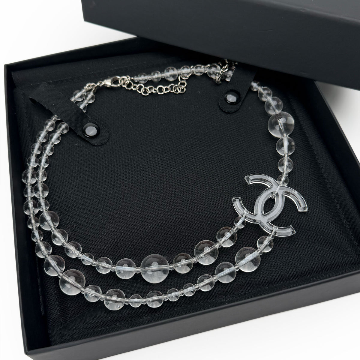 Clear transparent crystal bead necklace with interlocking CC logo pendant, curated Pre-loved Luxury by Myluxe in Helsinki.