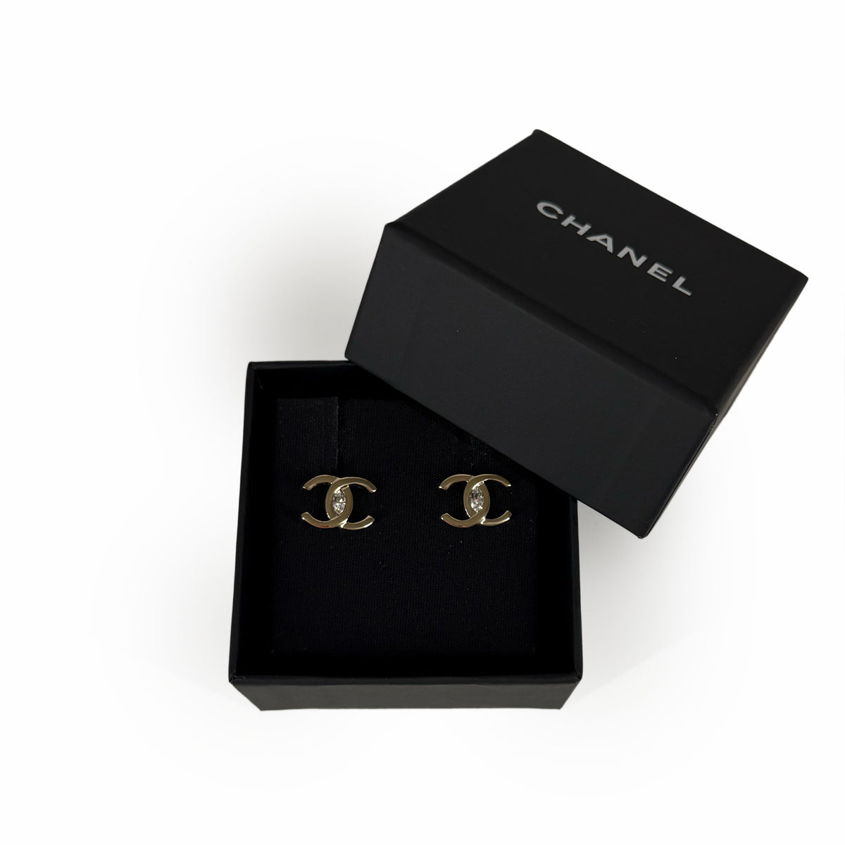 Chanel gold-tone interlocking CC earrings with crystal accents, curated Pre-loved Luxury by Myluxe in Helsinki.