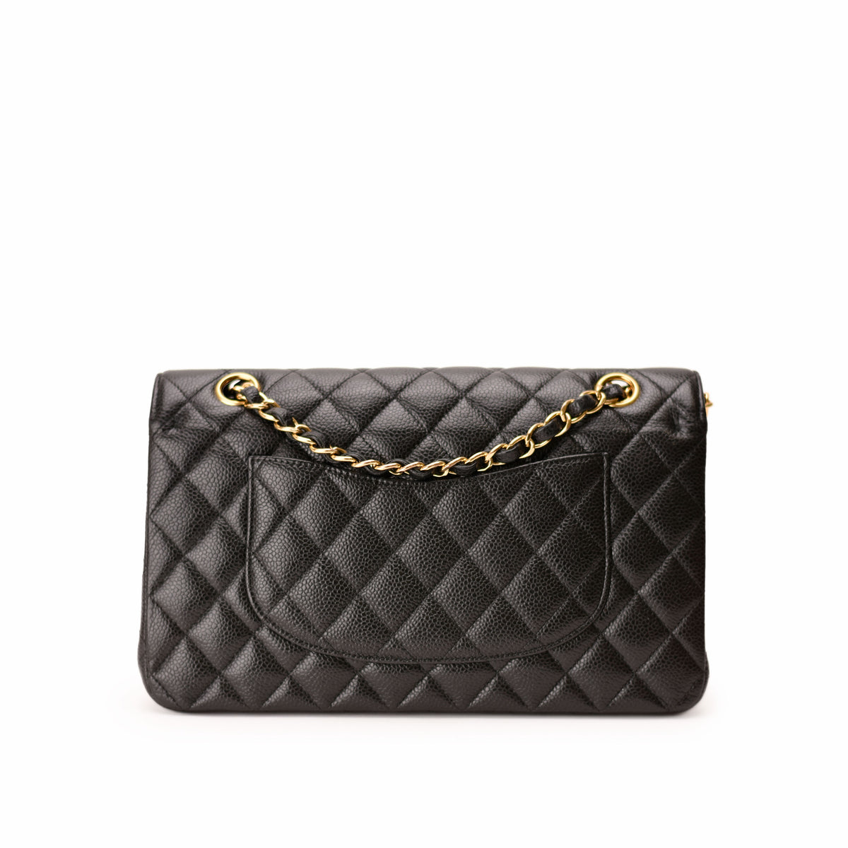 Black quilted caviar leather Chanel handbag with gold chain strap, curated Pre-loved Luxury by Myluxe in Helsinki.