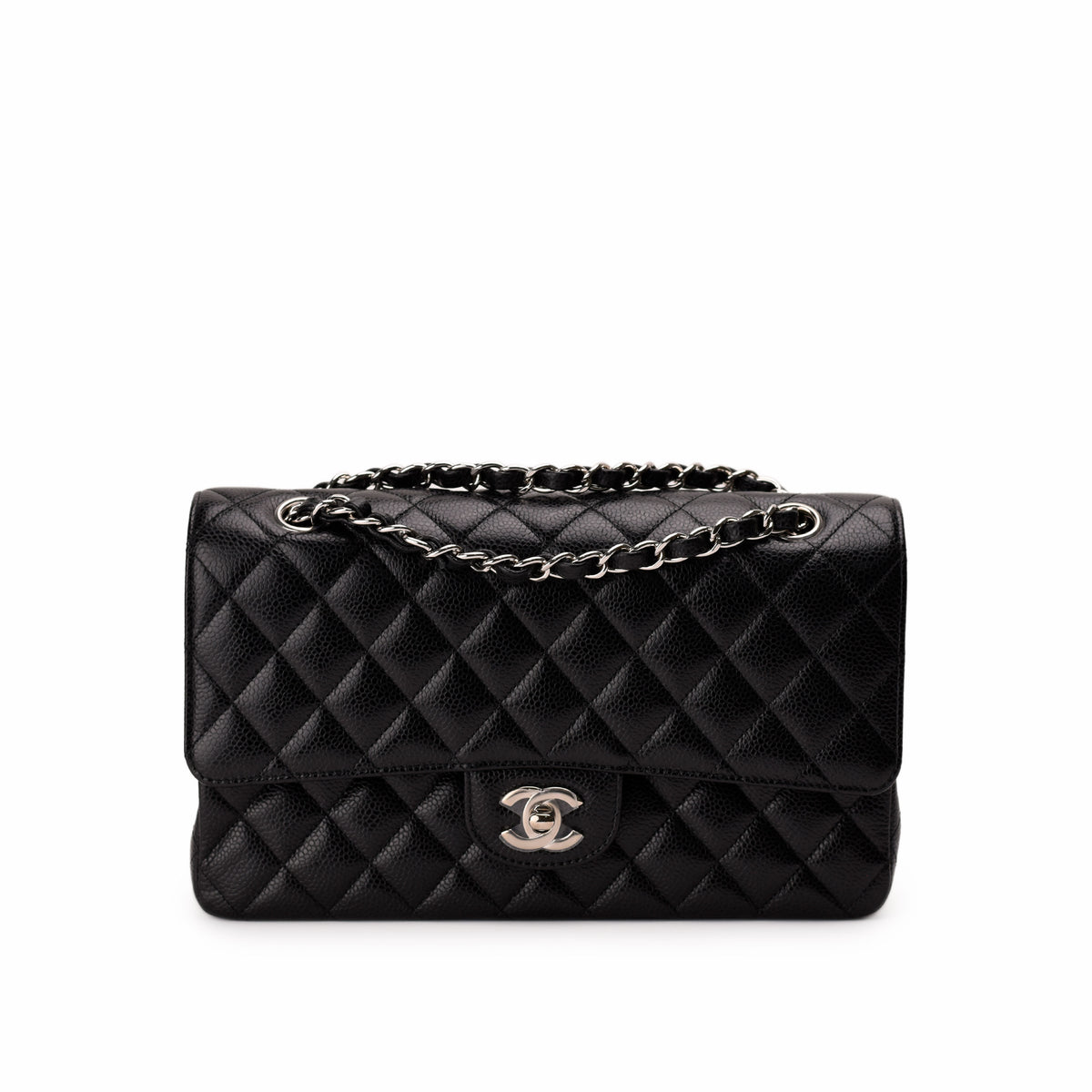 Black quilted caviar leather Chanel handbag with silver chain strap, curated Pre-loved Luxury by Myluxe in Helsinki.