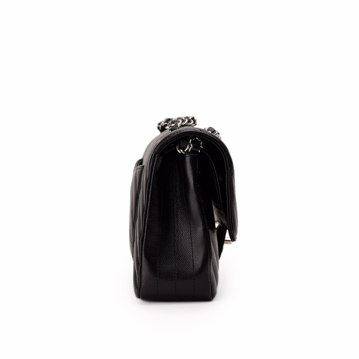 Black quilted leather handbag with silver chain strap, curated Pre-loved Luxury by Myluxe in Helsinki.