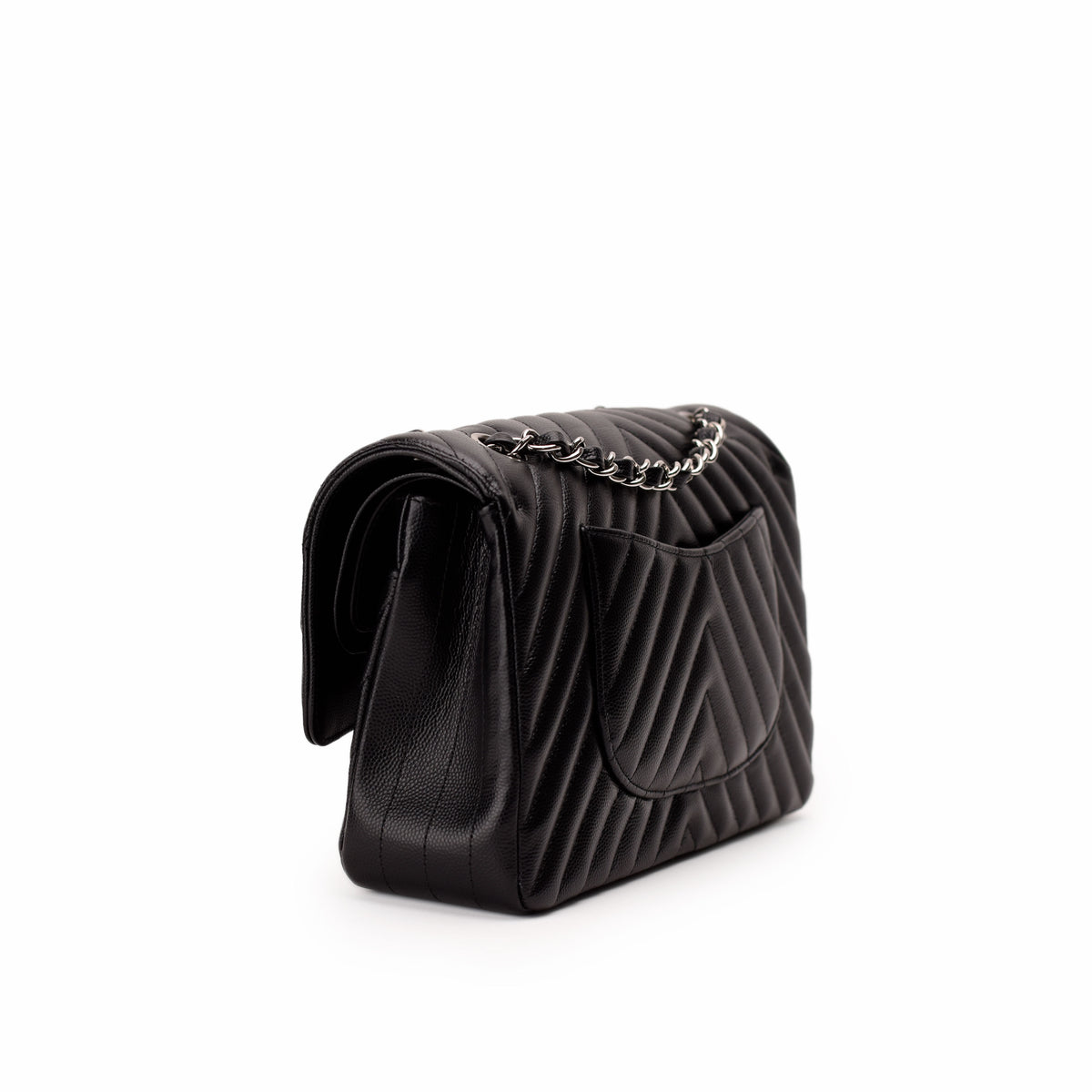 Black quilted leather flap handbag with silver chain strap, curated Pre-loved Luxury by Myluxe in Helsinki.