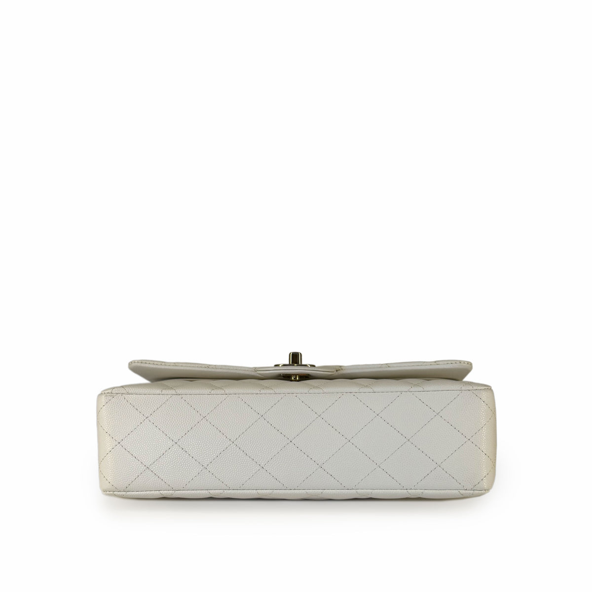 White quilted leather clutch with gold-tone hardware, curated Pre-loved Luxury by Myluxe in Helsinki.