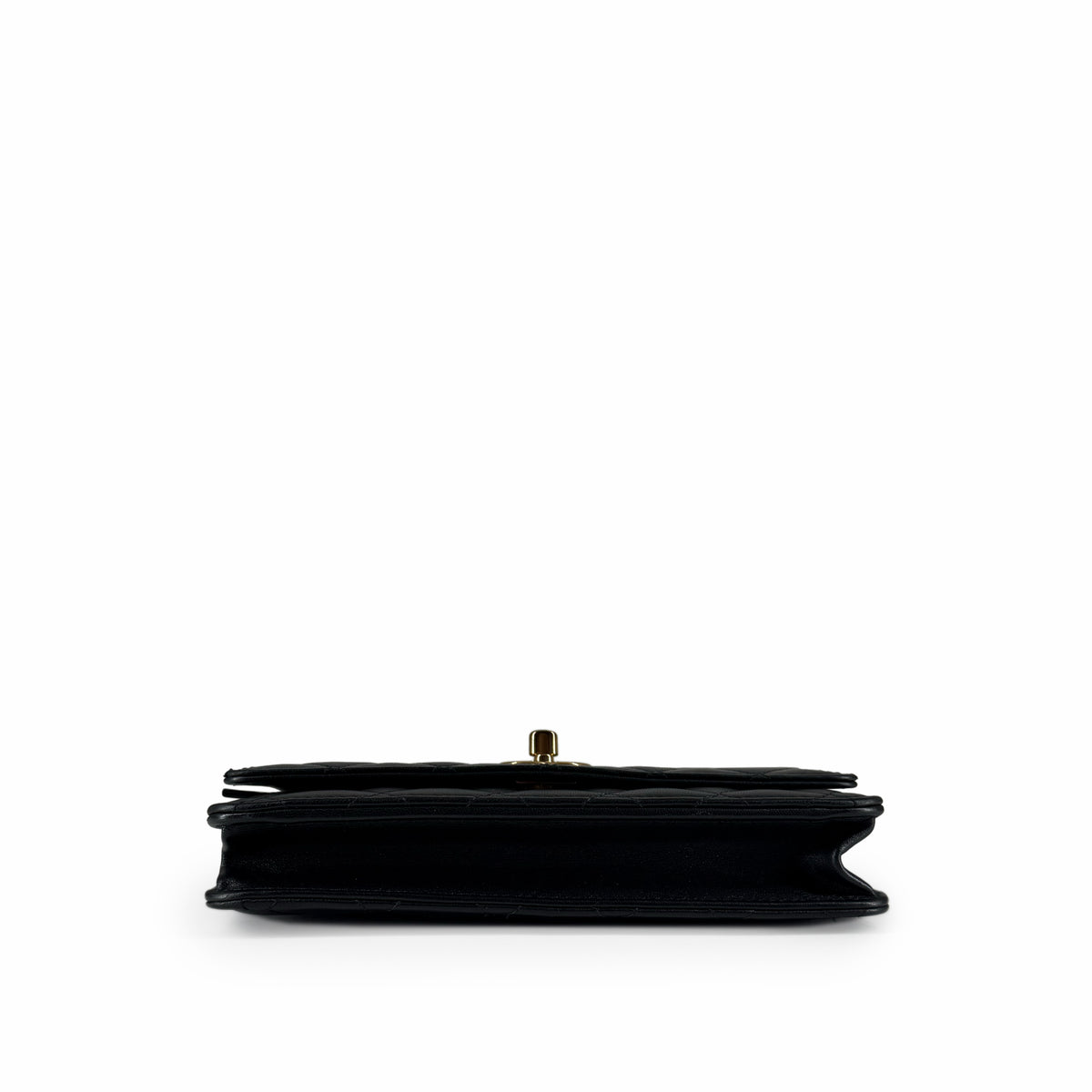 Black quilted leather clutch with gold-tone clasp, curated Pre-loved Luxury by Myluxe in Helsinki.