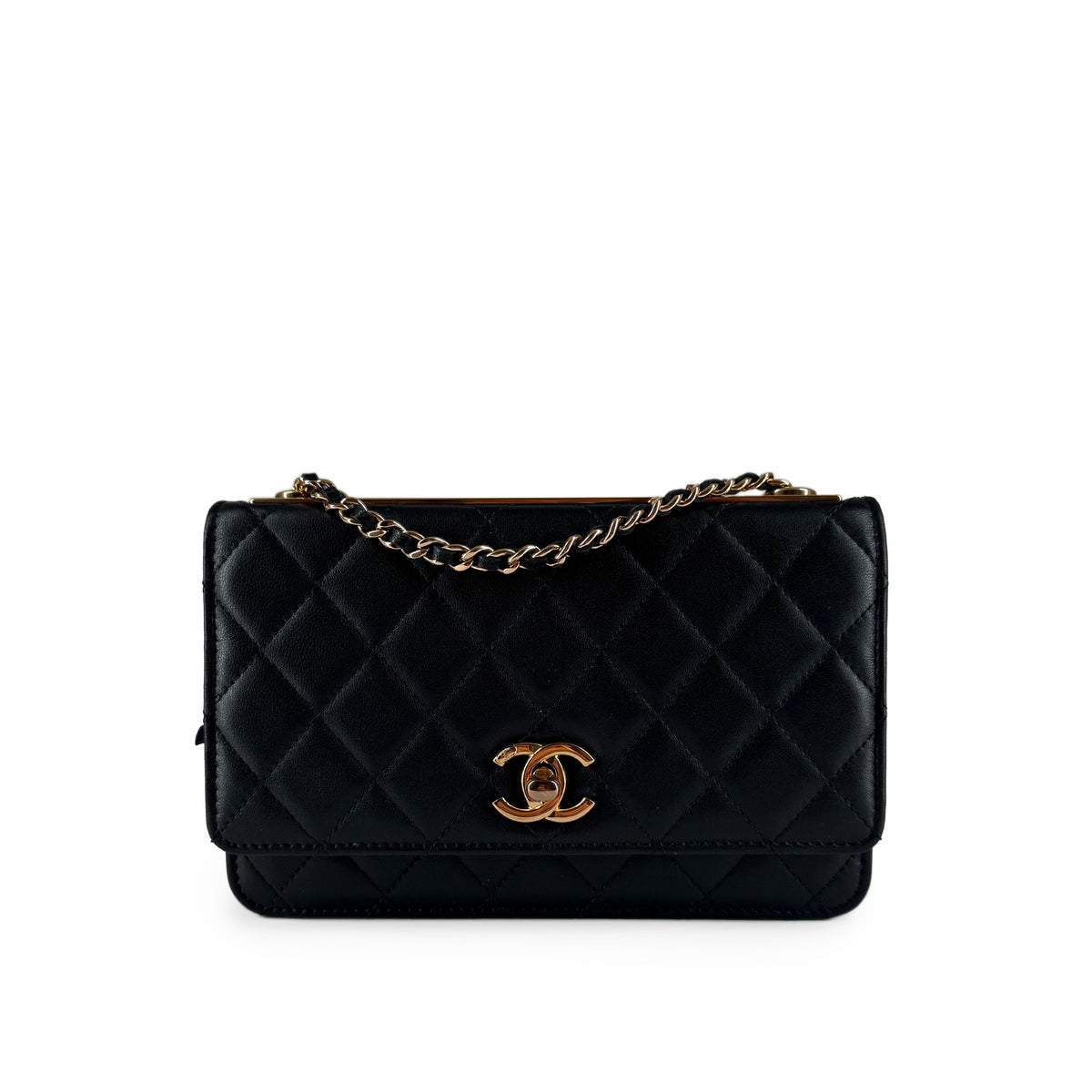 Black quilted leather Chanel flap bag with gold-tone chain and CC logo, curated Pre-loved Luxury by Myluxe in Helsinki.