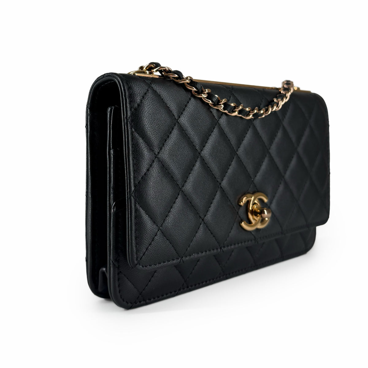 Black quilted leather Chanel flap bag with gold chain strap, curated Pre-loved Luxury by Myluxe in Helsinki.