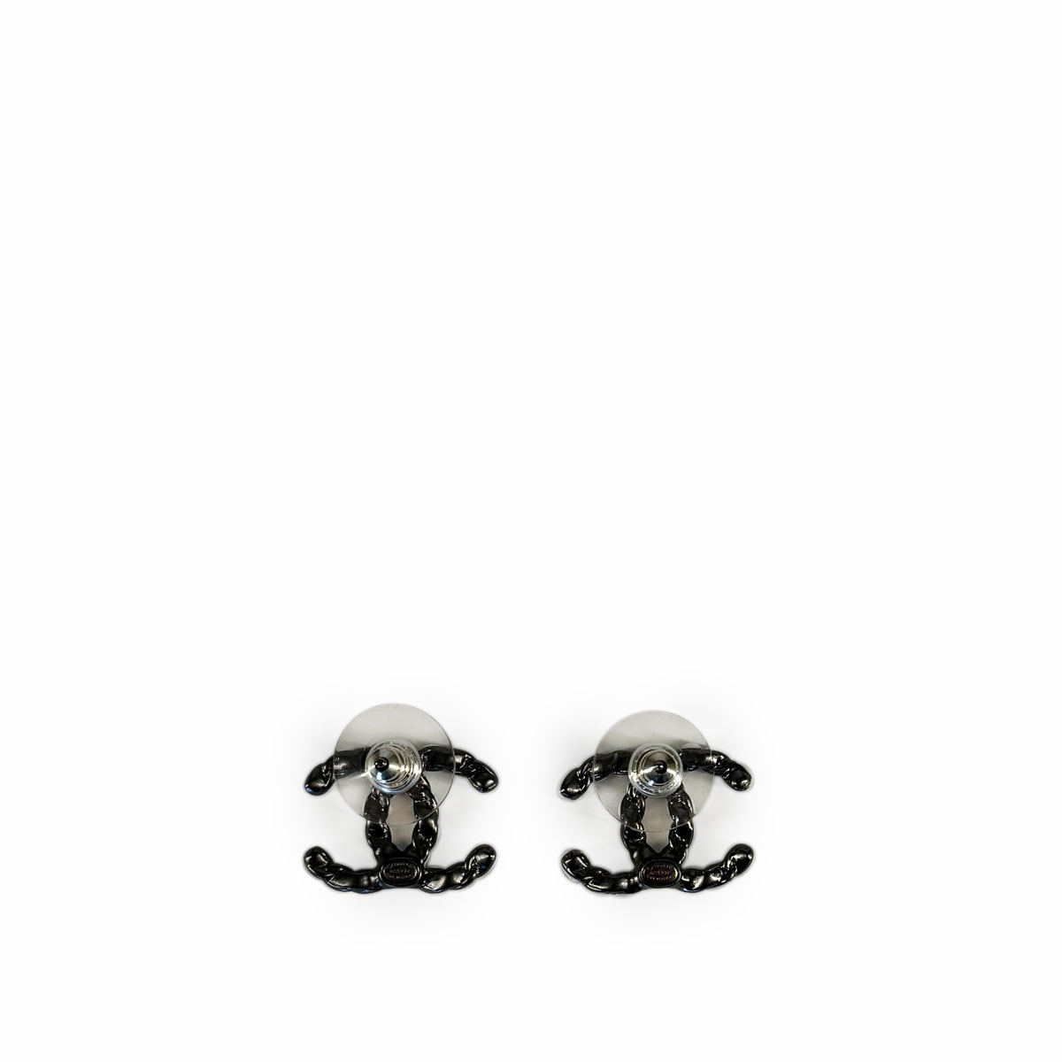 Silver-tone Chanel interlocking CC logo stud earrings, curated Pre-loved Luxury by Myluxe in Helsinki.